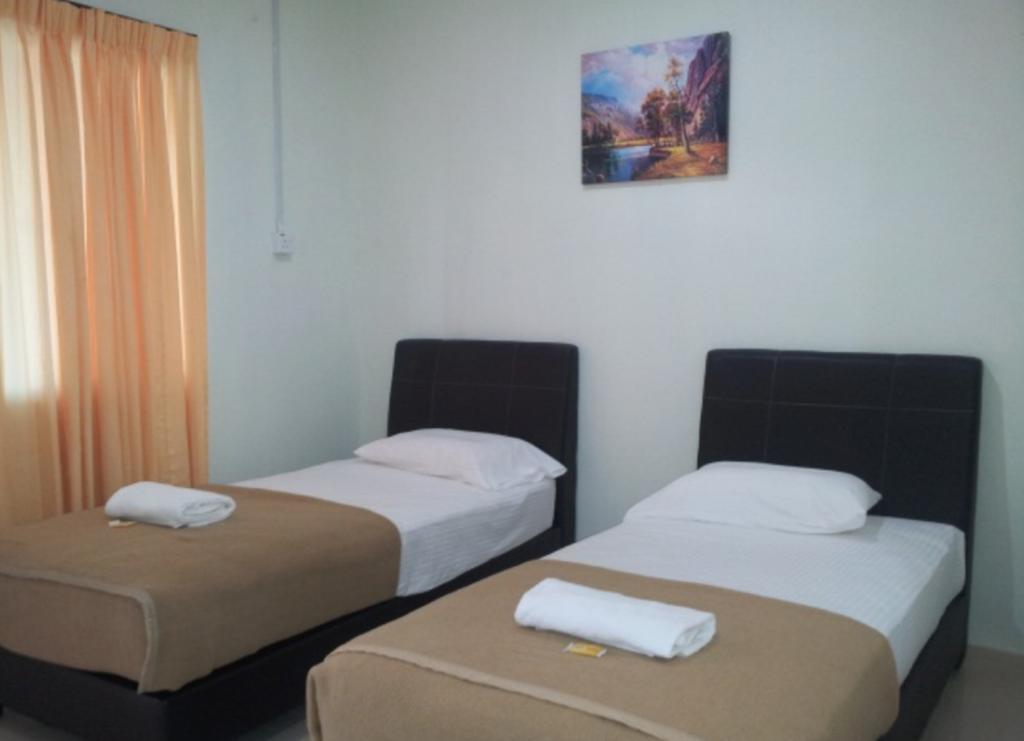 Huda Inn Pantai Cenang  Phòng bức ảnh